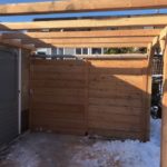 pergola douglashout met schutting en schuifpoort